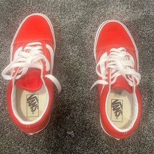 Red and white vans woman’s size 9 men’s size 7.5 worn once.